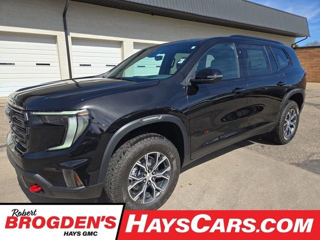 2026 GMC Acadia AT4 in Ebony Twilight Metallic — front three-quarter view