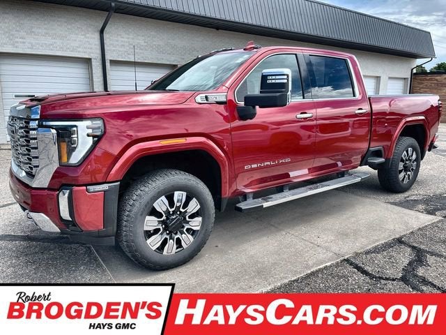 2024 GMC Sierra 2500 HD Denali in Volcanic Red Tintcoat — front three-quarter view