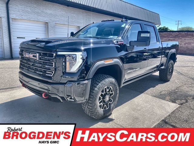 2026 GMC Sierra 2500 HD AT4X in Onyx Black — front three-quarter view