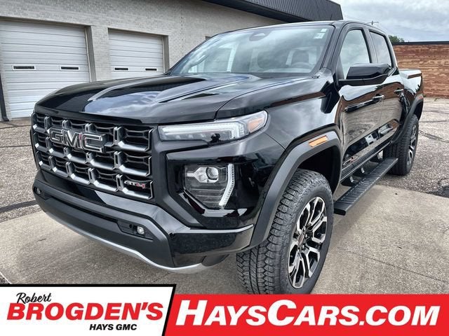 2026 GMC Canyon AT4 in Onyx Black — front three-quarter view