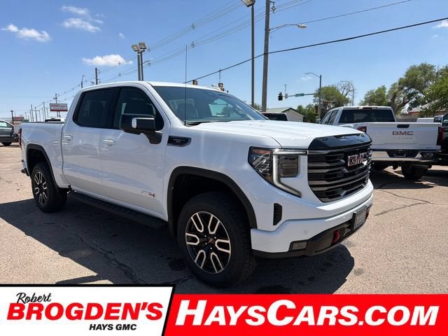 2026 GMC Sierra 1500 AT4 in Summit White — front three-quarter view