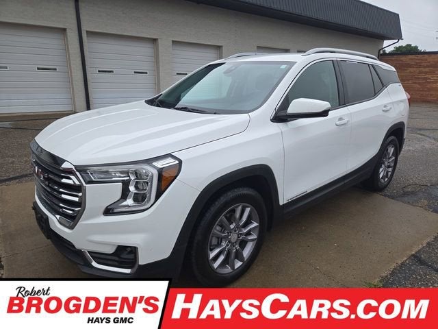 2024 GMC Terrain SLT in Summit White — front three-quarter view