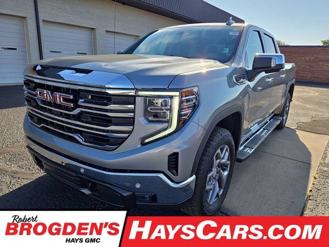 2026 GMC Sierra 1500 SLT in Sterling Metallic — front three-quarter view