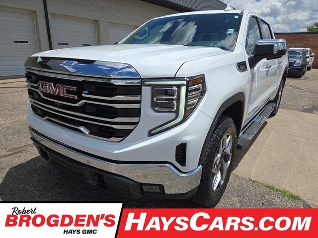 2026 GMC Sierra 1500 SLT in Summit White — front three-quarter view